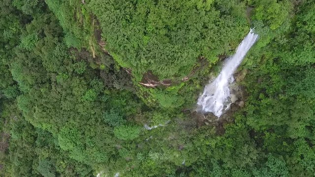 A surprising snapshot of the drone in the fall in Salalah, Ain Darbat, Sultanate of Oman