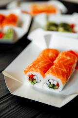 Sushi with salmon, philadelphia rolls, asian food.