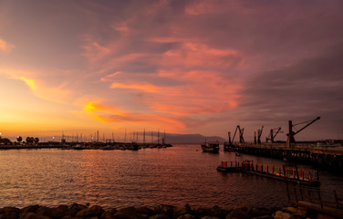Fototapeta premium Antofagasta, Chile; December 26, 2018: beautiful sunset colors and colored clouds.