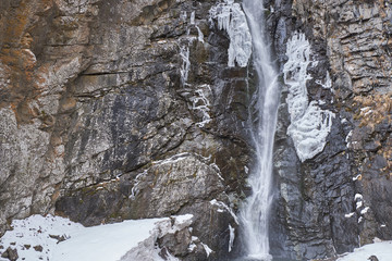 Fototapeta na wymiar waterfall in the mountains of the Caucasus