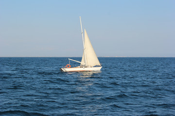 Sail yacht in the sea, summer holidays, sailing sport, water transport, luxury lifestyle, peaceful landscape, travel and vacation concept