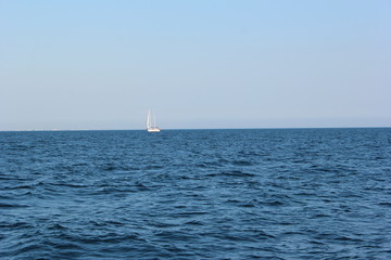 Sail yacht in the sea, summer holidays, sailing sport, water transport, luxury lifestyle, peaceful landscape, travel and vacation concept