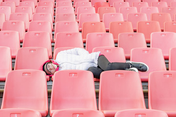 Young girl on the stadium stand