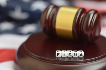 Justice mallet and FISMA acronym. Federal information security management act