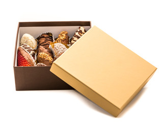 Strawberries covered with chocolate, hazelnuts