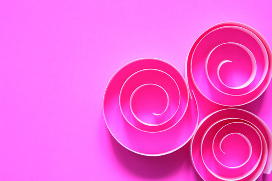 Paper Spirals On Pink - Powered by Adobe