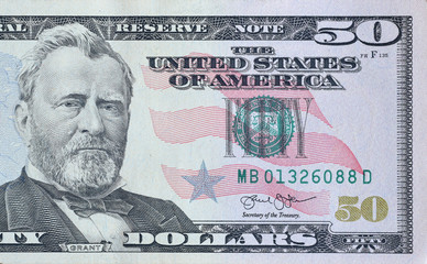 Portrait of US president Ulysses Simpson Grant on 50 dollars banknote closeup macro fragment. United states fifty dollars money bill