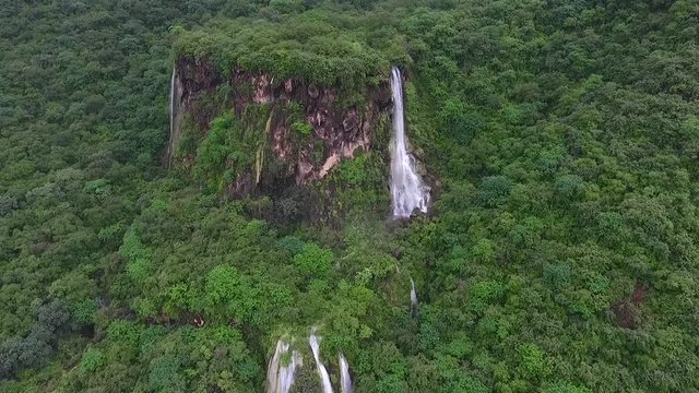 A surprising snapshot of the drone in the fall in Salalah, Ain Darbat, Sultanate of Oman