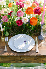 Table setting at a luxury wedding and Beautiful flowers on the table.