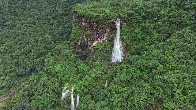 A surprising snapshot of the drone in the fall in Salalah, Ain Darbat, Sultanate of Oman