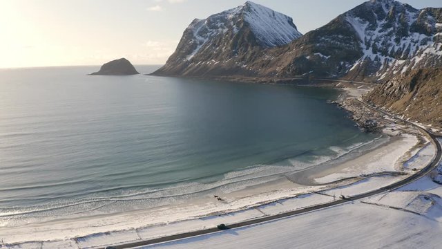 aerial video of horses on the beach. very special video of horses on winter sand beach in lofoten islands. Vik/haukland beach is famous tourist destination but now is almost empty due to corona virus.