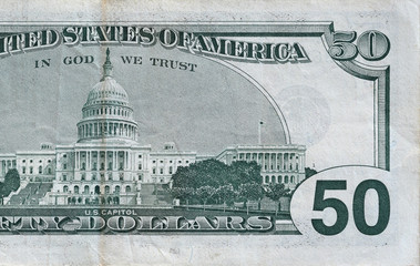 US Capitol on 50 dollars banknote back side closeup macro fragment. United states fifty dollars...