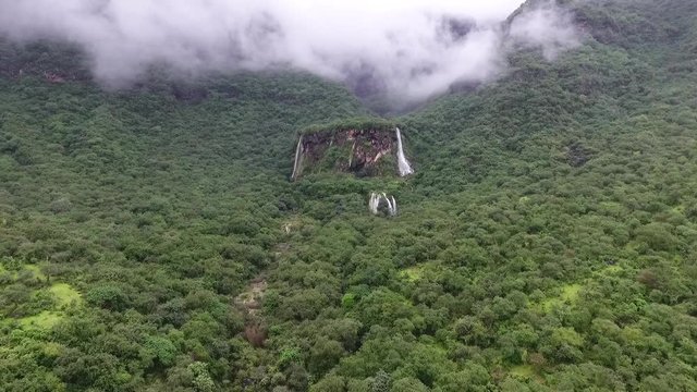 A surprising snapshot of the drone in the fall in Salalah, Ain Darbat, Sultanate of Oman 