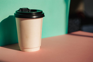 Man hand coffee cup. Coffee time. Hand. Man. Good morning. Background. Drink. Plastic. Cafe.