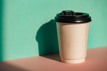 Man hand coffee cup. Coffee time. Hand. Man. Good morning. Background. Drink. Plastic. Cafe.