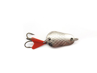 Iron spinner for fishing isolated on a white background. Hard spinner for fishing. Heavy lure.