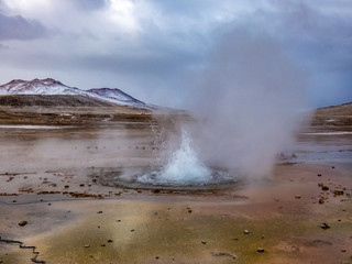 Beautiful landscape of geysers of El Tatio in winter and snowy.