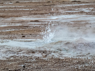 Beautiful landscape of geysers of El Tatio in winter and snowy.