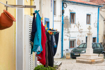 Clothes drying up in front of the window