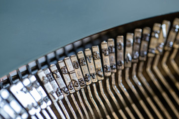 Close up of old fashioned vintage typewriter typebars