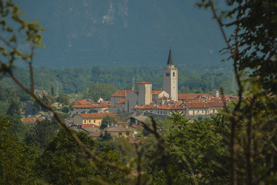 Panoramic view of italian city of Venzone, viewed from far away, looking towards the cathedral. Town fully restored after the earthquake in 1976.