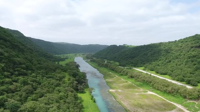 A surprising snapshot of the drone in the fall in Salalah, Ain Darbat, Sultanate of Oman 