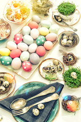 Easter table decoration colored eggs vintage toned