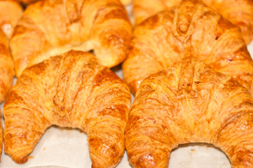 Top view, close distance. of freshly prepared, homemade crescents, on display and for sale at a tropical farmers market 