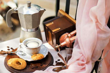morning coffee with biscuits, Morning coffee in the backyard. Cup with fresh coffee, cookies, mocha...