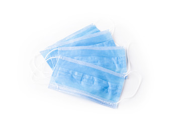 Medical respiratory mask protection against coronavirus. Covid-19 virus safety blue masks isolated on white background. Surgical hygienics bandage face. Antiviral infection mask with clipping path