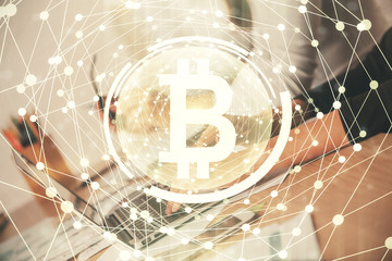 Double exposure of woman hands typing on computer and crypto market theme hologram drawing. Blockchain concept.