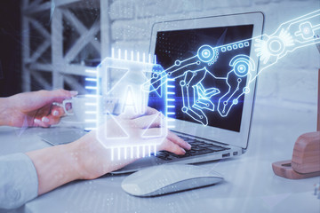 Double exposure of woman hands working on computer and data theme hologram drawing. Tech concept.