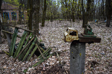 Rusty old toy truck children lying in forest creepy