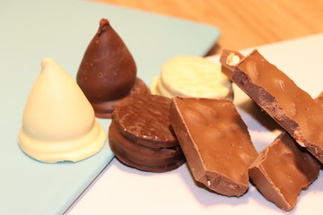 Different types of chocolates and alfajores.