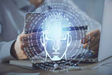 Double exposure of man hands typing on computer with credit card and brain theme drawing....