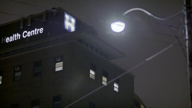 Hospital Exterior Night 1 of 3. Matching set of day night. Free preview. Shot on 4k.