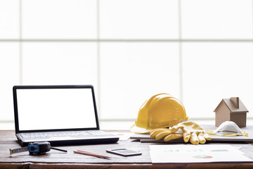 construction worker with laptop