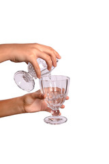 woman is holding a glass cup in her hand - white background