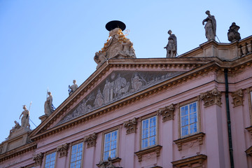 Fototapeta na wymiar Detail of a pink palace facade in Bratislava