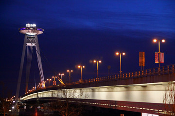 Bratislava bridge and landmark at sunset