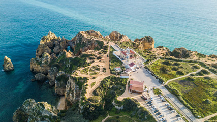 Aerial view of Ponta da Piedade, in Lagos, Algarve, Portugal. Cliff rocks on sea at Ponta da Piedade, Algarve region, Portugal