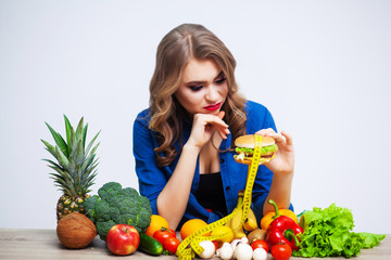 Nice woman wants to eat hamburger harmful