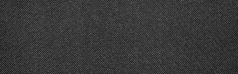 Texture of dense black fabric.Dark diamond-shaped background fabric.Black braided texture.