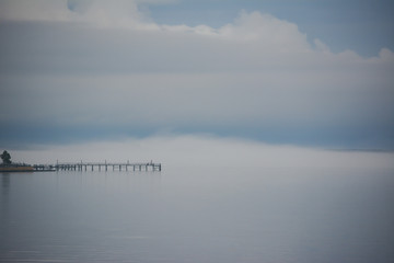 Fog floating over the Potomac River in Colonial Beach, Virginia.