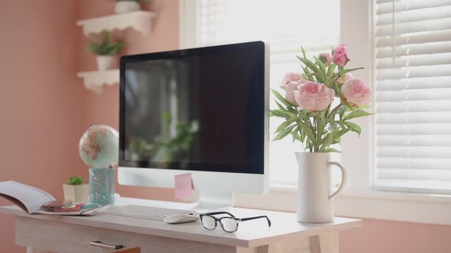 woman working from home office taking a short break