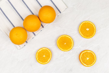 Top view of sliced orange on the white background