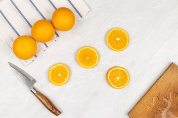 Top view of sliced orange on the white background