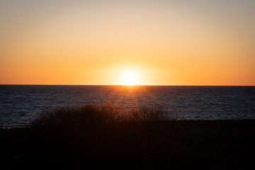 Beautiful golden sunset over Oresund in Hittarp, Helsingborg, Sweden