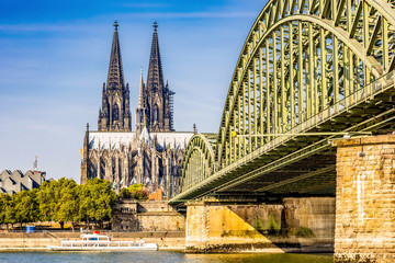 Cologne with the Cologne Cathedral and the Hohenzollern Bridge in the light of the morning sun
