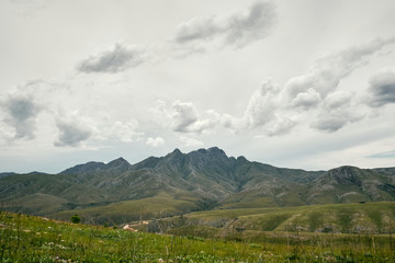 Fototapeta na wymiar Mountain range with clouds 